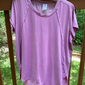 Champion light pink shirt.  Sheer panel on…